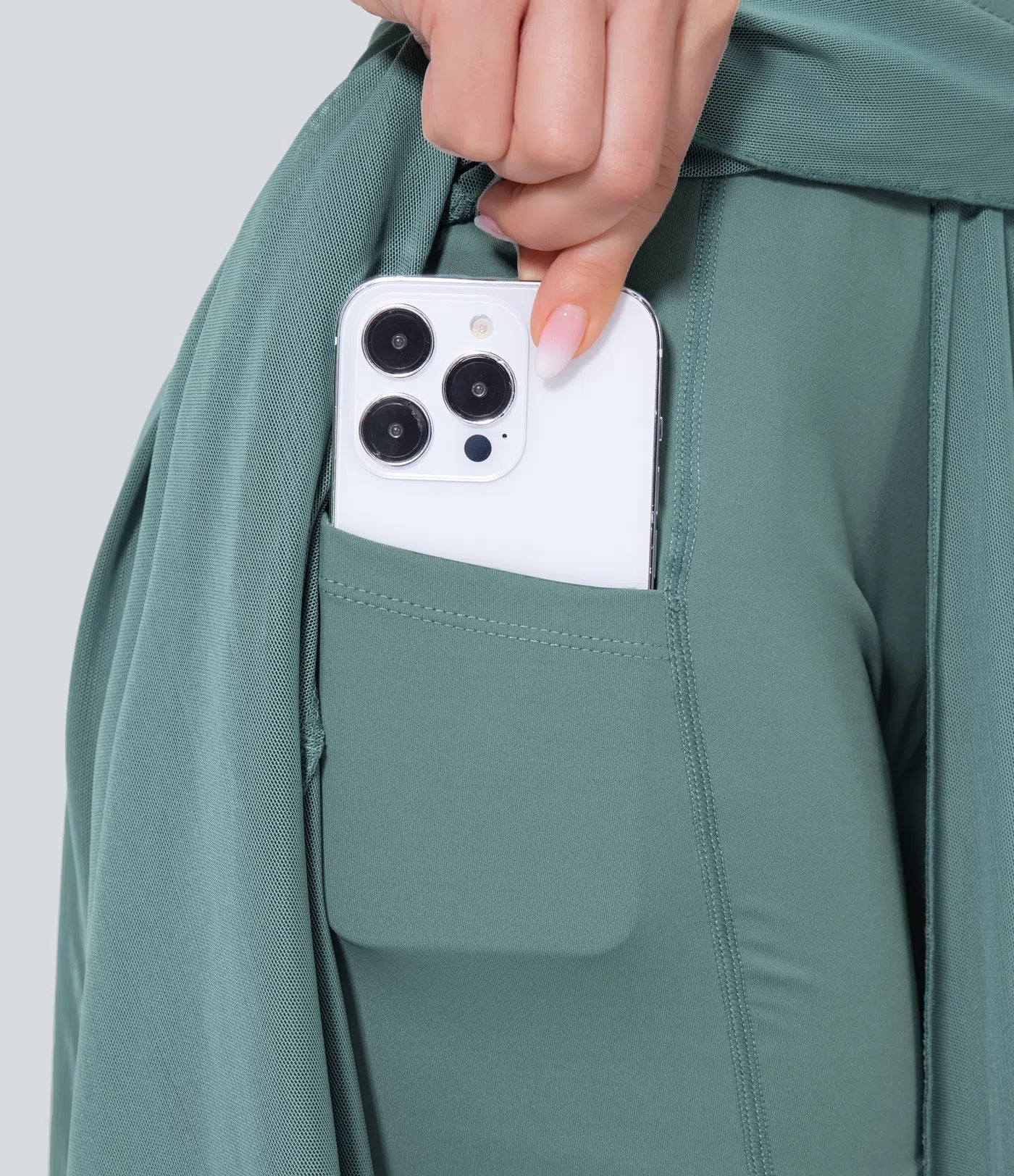 Nordyx™2-i-1-design: Høytlivs skjørt med snøring, kontrast-mesh og praktiske lommer